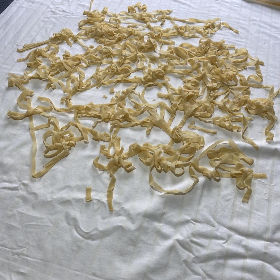 Bosnian homemade pilav pasta on a white cloth