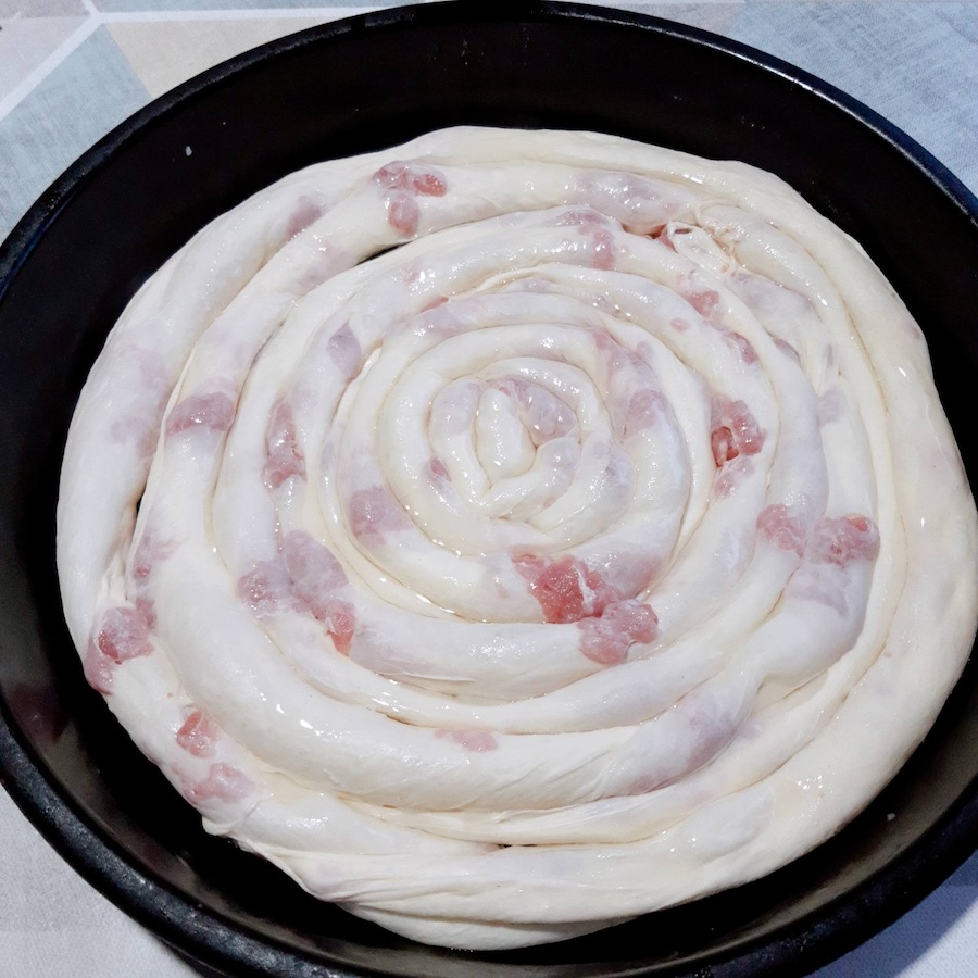 Burek with chopped meat before baking