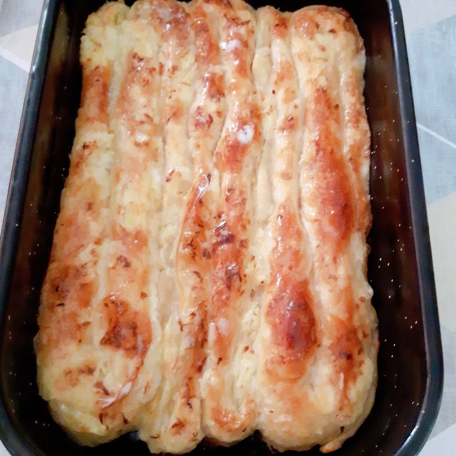 Cabbage pie in a tray after baking